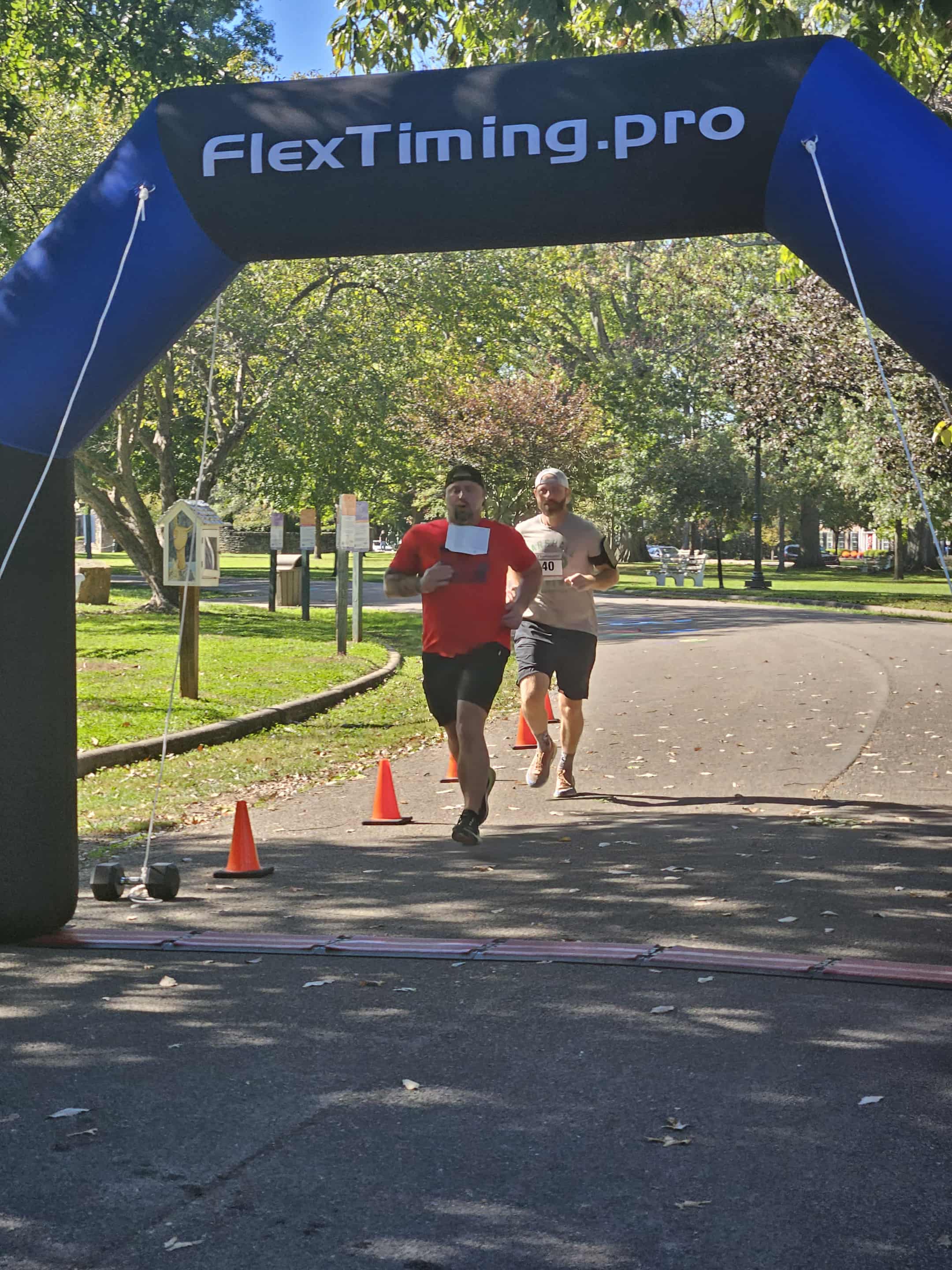 An adult Diamond Wellness Classic finish line moment.
